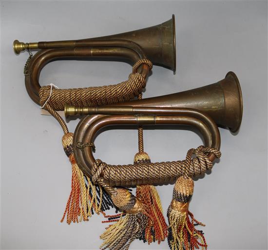 Two copper and brass bugles